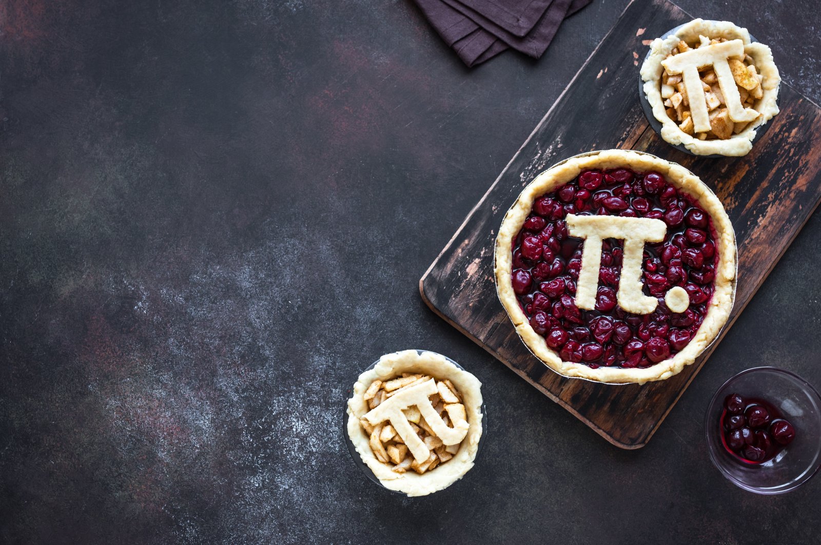 A homemade cherry and apple pie for the Pi Day holiday. (Shutterstock Photo)