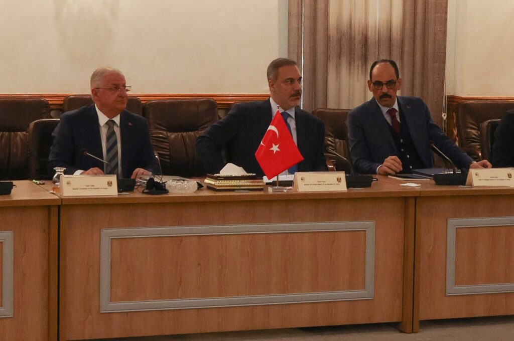 Foreign Minister Hakan Fidan (C), Defense Minister Yaşar Güler (L) and National Intelligence Agency (MIT) head Ibrahim Kalin meet with Iraq's Foreign Minister Fuad Hussein (not pictured), in Baghdad, Iraq, March 14, 2024. (Reuters Photo)