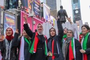 Türkiye's Women and Democracy Foundation (KADEM) commemorate Palestinian women who lost their lives in Israel's attacks on Gaza, Times Square, New York, U.S., March 14, 2024. (AA Photo)