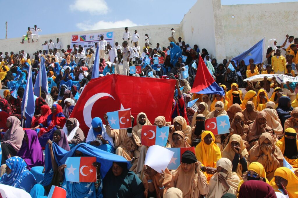 After Somali President Hassan Sheikh Mohamud announced the signing of a defense and economic pact with Türkiye, Somalis attending the celebration ceremony in the capital Mogadishu enthusiastically waved both Turkish and Somali flags, Mogadishu, Somalia, Feb. 24, 2024. (AA Photo)