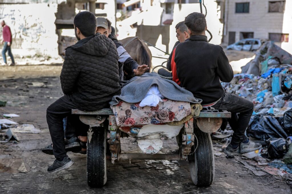 Palestinians transport the body of a relative killed in Israeli bombardment in Gaza City, Palestine, March 15, 2024. (AFP Photo)