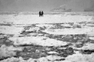 A photograph by Ozan Sağdıç of ice blocks from the Danube River traveling through the Black Sea, amassed in the Bosporus and the Golden Horn, halting sea traffic, Istanbul, Türkiye, February 1954. (Photo courtesy of Istanbul Modern)