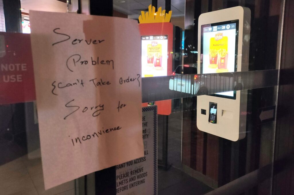 A sign adorns the entrance to a McDonald's restaurant in the Sydney suburb of Maroubra, Australia, March 15, 2024. (AFP Photo)