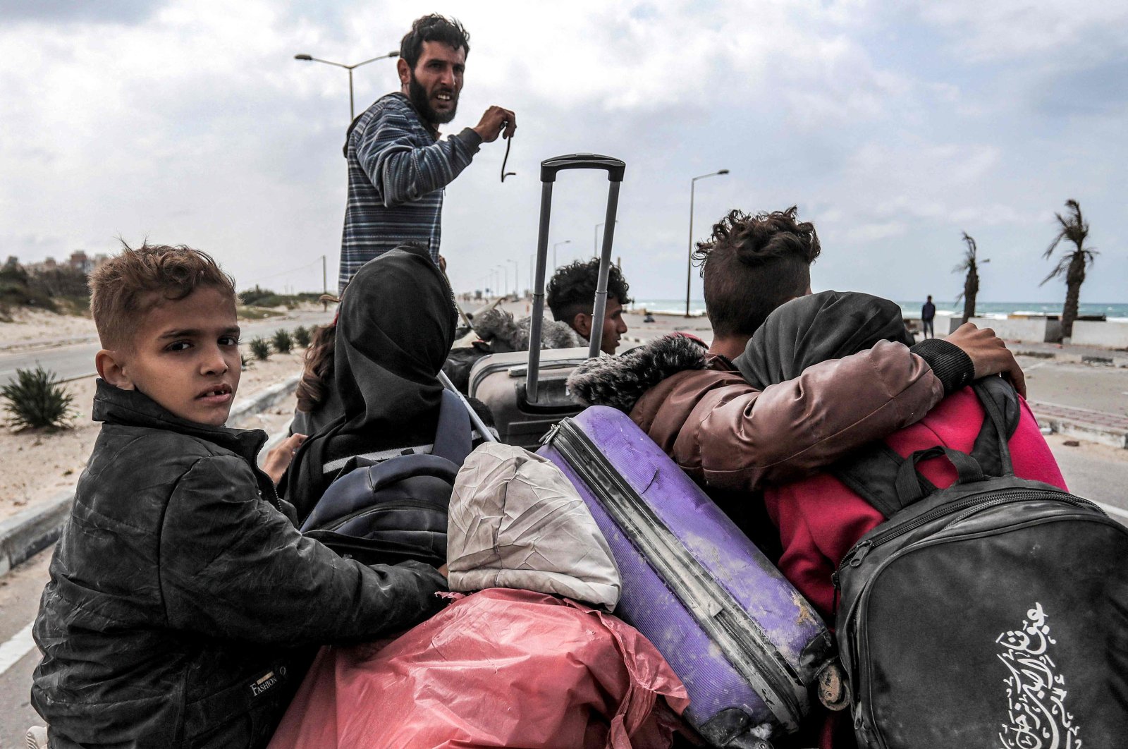 Displaced Palestinians fleeing from the area in the vicinity of Gaza City's Al-Shifa hospital arrive at the Nuseirat refugee camp, central Gaza, Palestine, March 18, 2024. (AFP Photo)