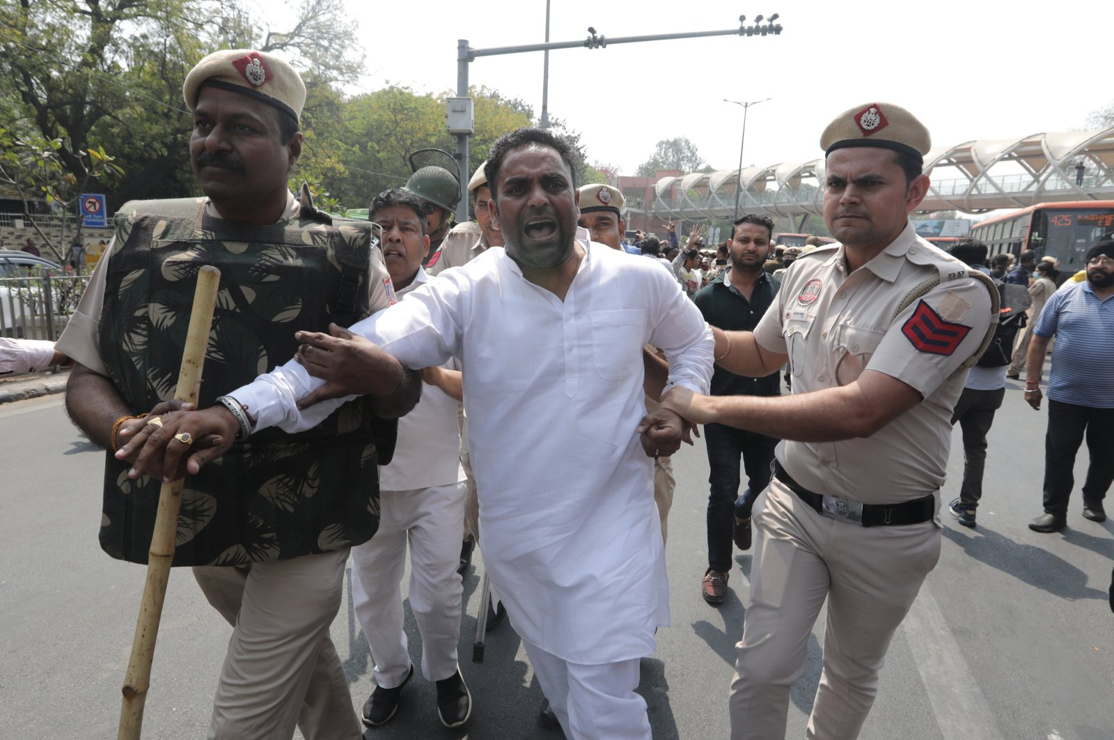 Indian security personnel detain a member of the Aam Aadmi Party (AAP) during a protest against Delhi Chief Minister Arvind Kejriwal's arrest, near Bharatiya Janta Party headquarters, New Delhi, India, March 22, 2024. (EPA Photo)