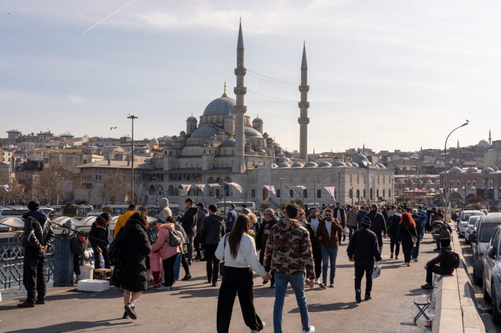 People go about their daily lives in Istanbul, Turkiye, on March 17, 2024. (Reuters Photo)