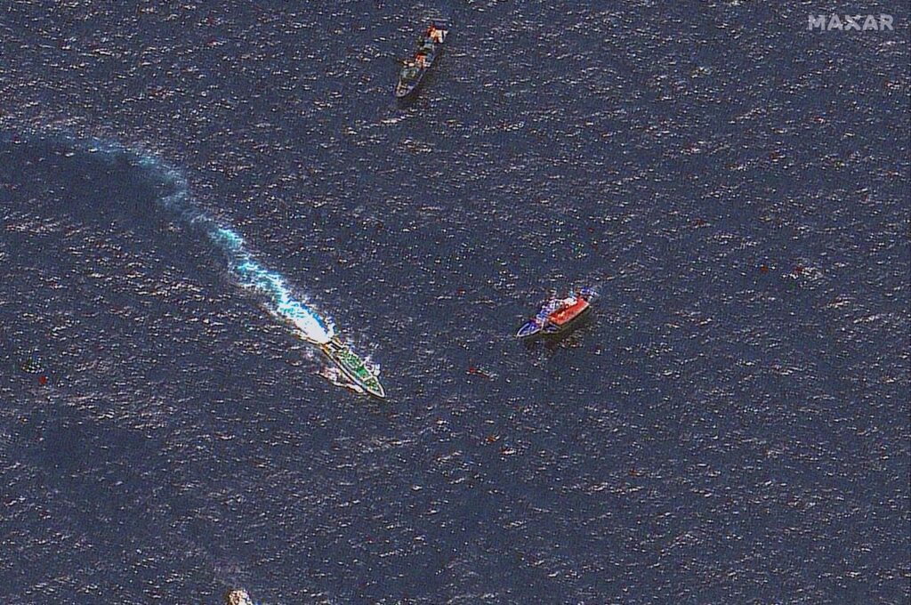 This satellite image shows Chinese and Philippine ships in contested waters of the South China Sea, March 24, 2024. (AFP Photo)
