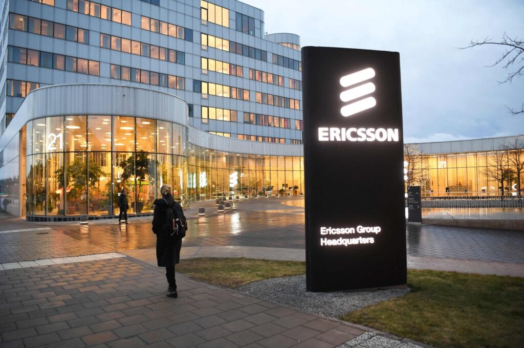 A woman walks past the Ericsson headquarters in Stockholm, Sweden, Jan. 24, 2020. (AFP Photo)