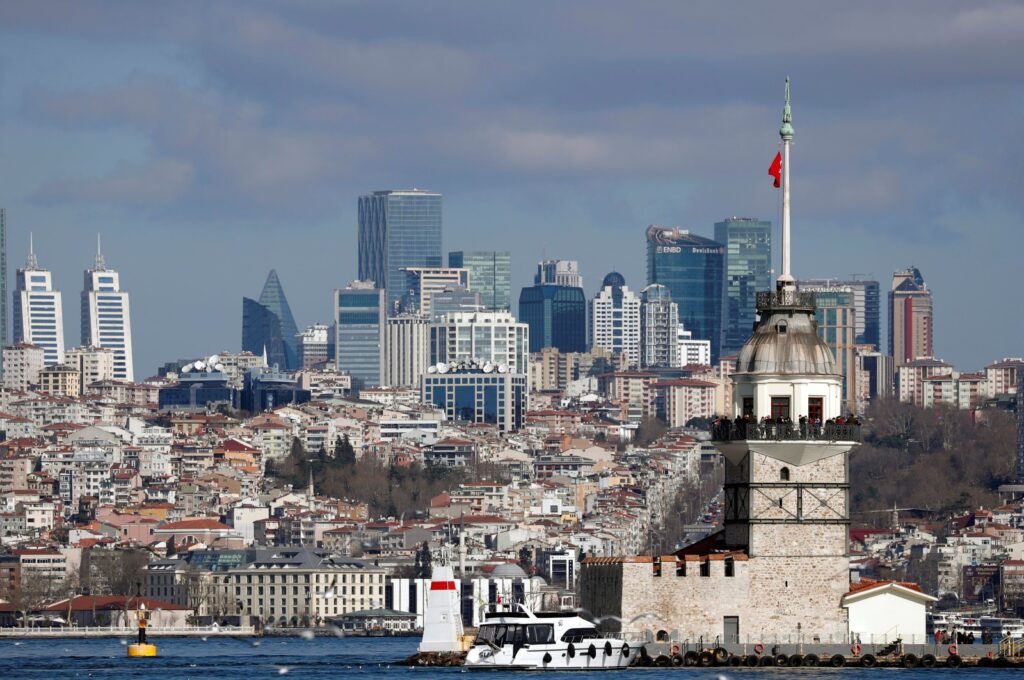 Maiden's Tower, an islet on the Bosporus, is pictured with the city's skyscrapers in the background in Istanbul, Türkiye, Feb. 23, 2020. (Reuters Photo)