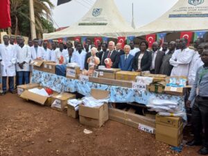 Turkish officials and staff pose with South Sudanese officials and students during an aid ceremony in Malakal, South Sudan, March 27, 2024. (Courtesy of TIKA)