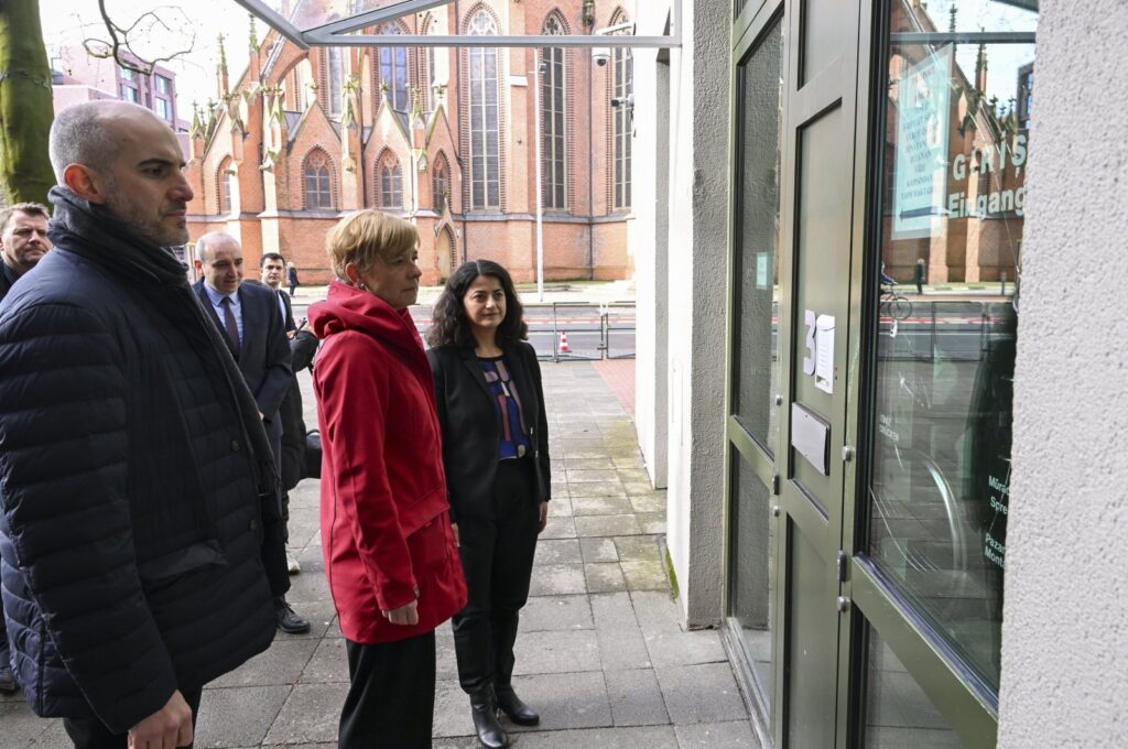 Mayor Belit Onay (L) and police chief Gwendolin von der Osten (C) inspect the damage inflicted by PKK sympathizers during a visit to the Turkish Consulate General in Hannover, Germany, March 28, 2024. (AA Photo)
