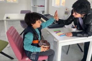 Mert Okutan, a 6-year-old autistic child from Şanlıurfa, exhibits piano skills, Şanlıurfa, Türkiye. March 29, 2024. (AA Photo)