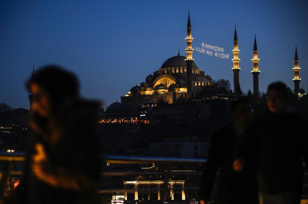 Lights message installed in between the minarets of the Suleymaniye mosque reads in Turkish "Ramadan is the month of Quran" ahead of the Muslim holy month of Ramadan in Istanbul, Türkiye, March 10, 2024. (AP Photo)