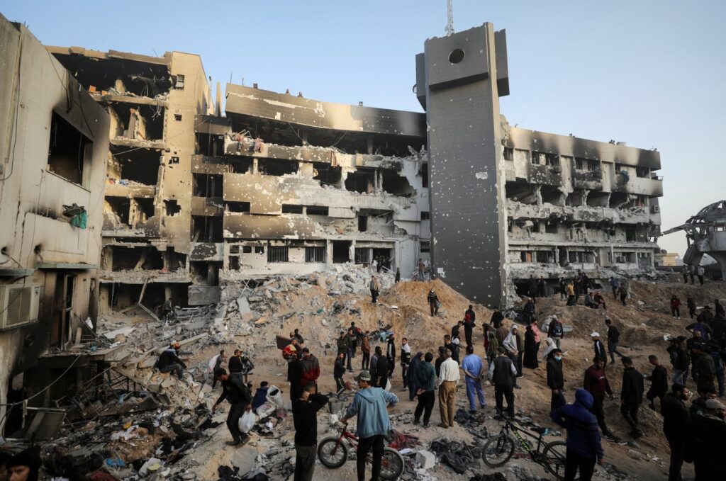 Palestinians inspect damages at Al-Shifa Hospital after Israeli forces withdrew from the hospital and the area around it following a two-week operation, in Gaza City April 1, 2024. (Reuters Photo)