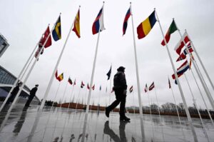 Flags of NATO member countries flutter on poles outside the bloc's headquarters, Brussels, Belgium, March 11, 2024. (AFP Photo)