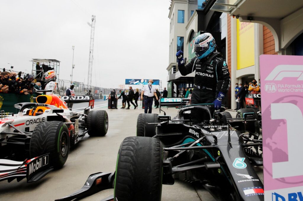 Mercedes' Valtteri Bottas gets out of the car after winning the Turkish Grand Prix race at the Intercity Istanbul Park, Istanbul, Türkiye, Oct. 10, 2021. (Reuters Photo)