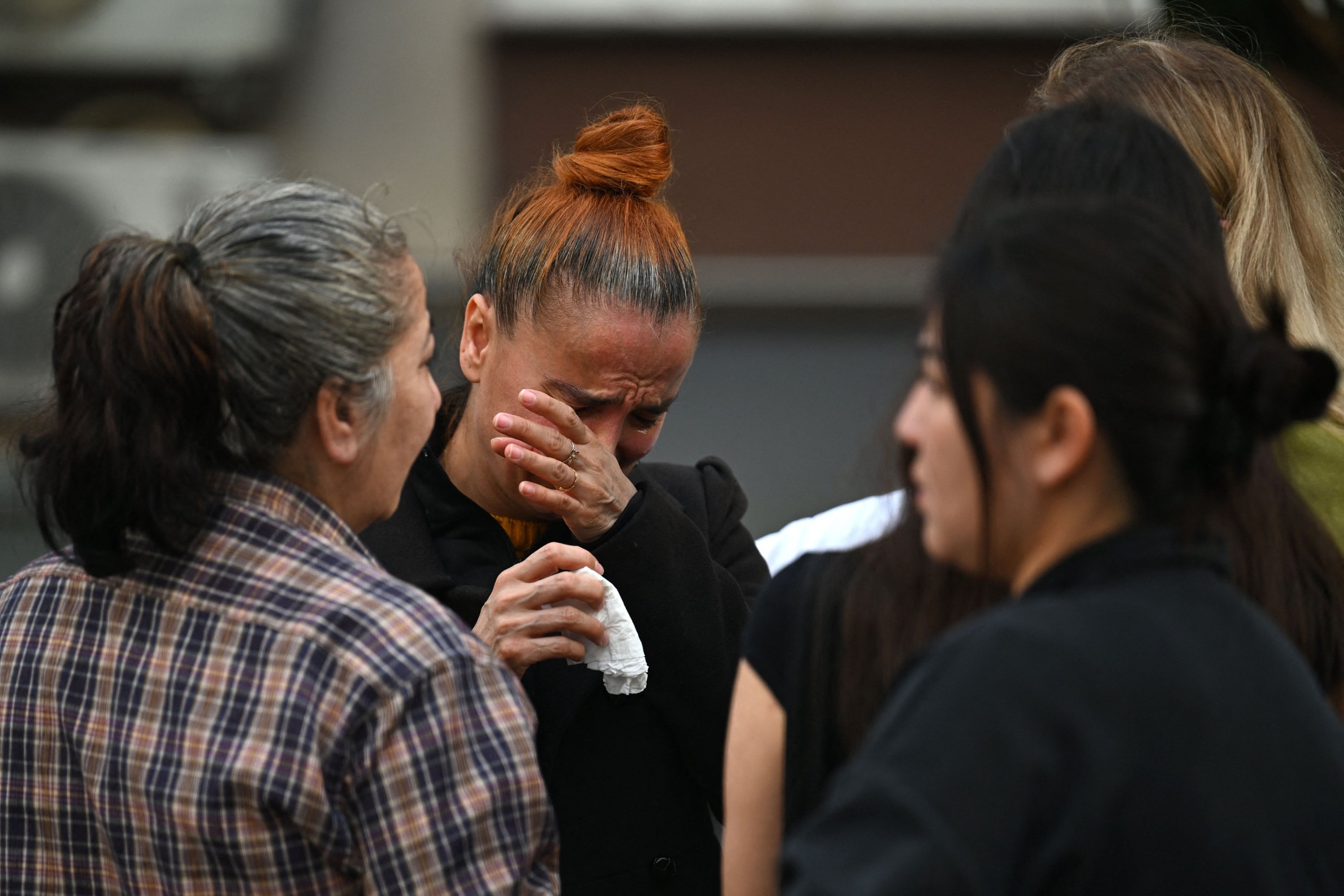 322220 Relatives of victims react near the site of a fire in a residential building in Istanbul, Türkiye, April 2, 2024. (AFP Photo)