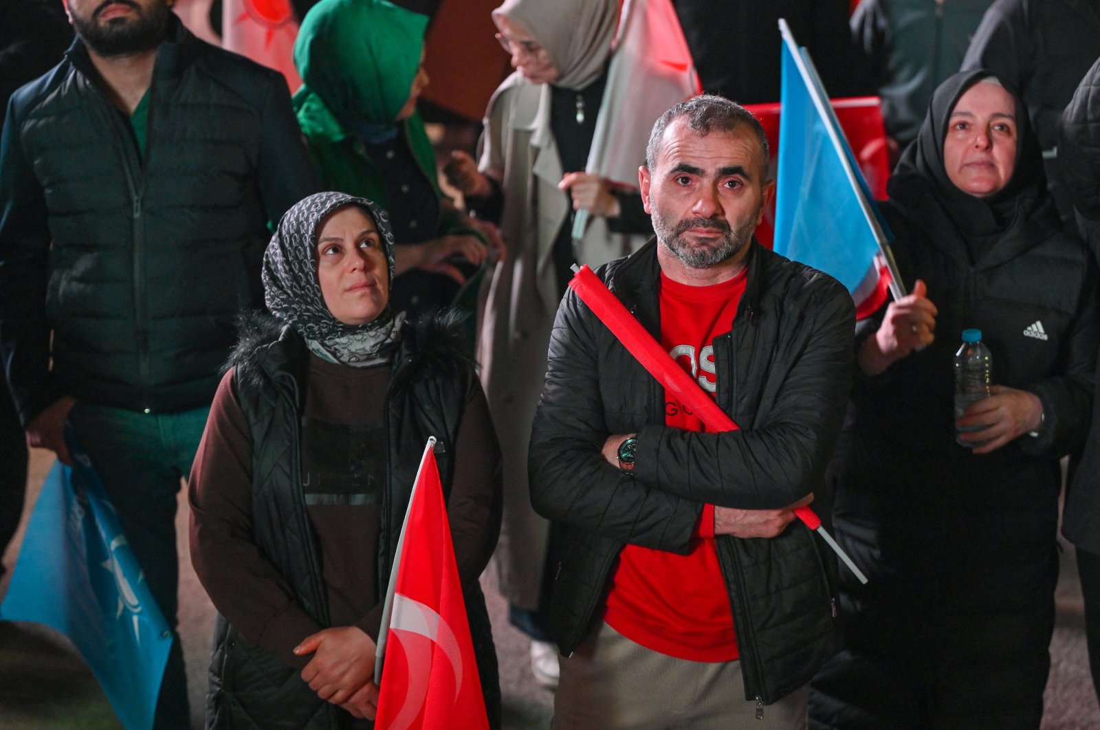 Supporters of President Recep Tayyip Erdoğan gather in front of the Justice and Development Party (AK Party) headquarters after the polls closed in the local elections in Ankara, Türkiye, March 31, 2024. (EPA Photo)