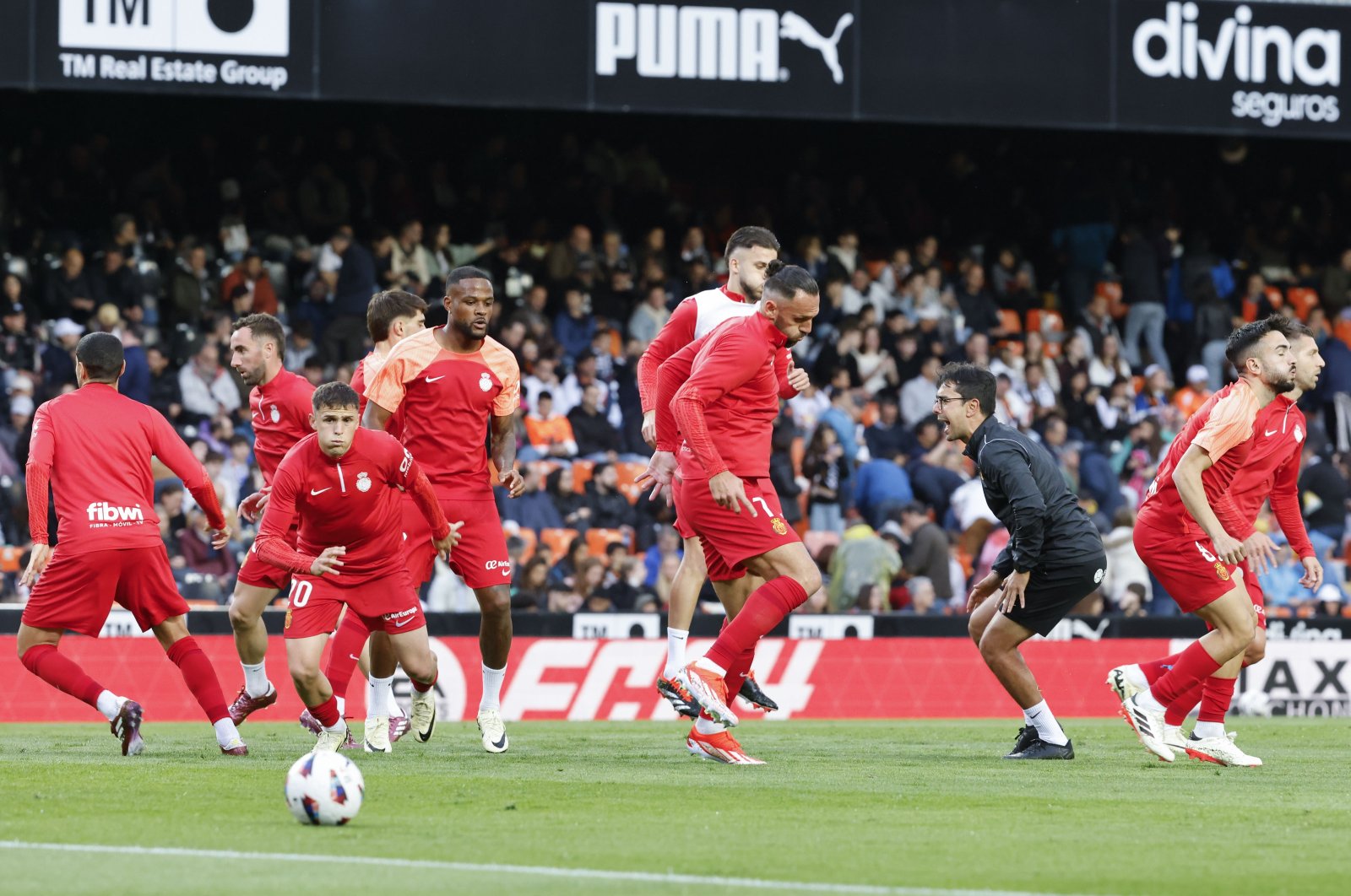 Mallorca players warm up ahead of the La Liga match against Valencia, Valencia, Spain, March 30, 2024. (EPA Photo)