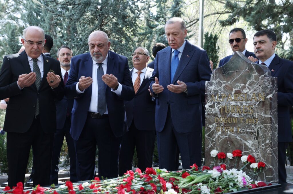 President Recep Tayyip Erdoğan (2nd R) and Alparslan Türkeş's son Yıldırım Tuğrul Türkeş pray by the grave of Alparslan Türkeş, Ankara, Türkiye, April 4, 2024. (AA Photo)