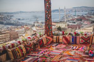 Istanbul from a high terrace decorated with traditional colorful ornamental pillows. (Shutterstock Photo)