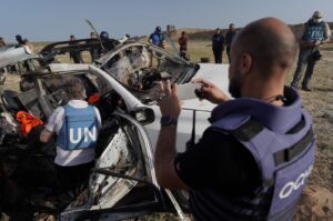 U.N. staff members inspect the remains of a car used by U.S.-based aid group World Central Kitchen that was hit by an Israeli strike the previous day, Deir al-Balah, Gaza Strip, Palestine, April 2, 2024. (AFP Photo)