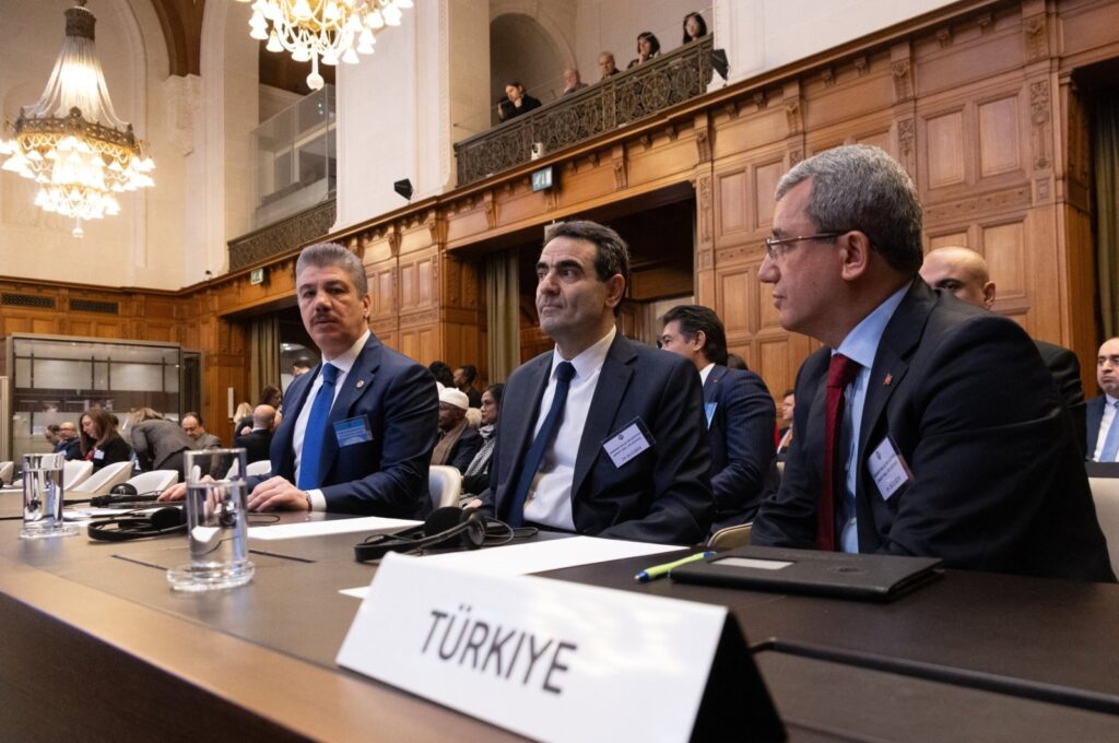 Deputy Foreign Minister Ahmet Yıldız (R), Turkish Parliamentary Justice Commission Chair Cüneyt Yüksel (L) and Turkish Ambassador to The Hague Selçuk Ünal (C) attend a hearing at the International Court of Justice (ICJ) on the legal consequences of the Israeli occupation of Palestine, The Hague, Netherlands, Feb. 26, 2024. (AA Photo)