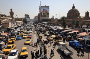Consumers and vehicles gather at Shorja market in central Baghdad, Iraq, March 7, 2024. (AFP Photo)