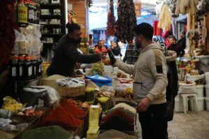 People shop at the Uzun Çarşı ("Long Bazaar") in Hatay, southern Türkiye, April 8, 2024. (AA Photo)