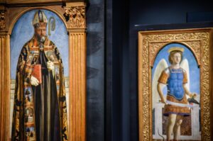 The paintings "Sant’Agostino" (L) and "San Michele Arcangelo" (R), two panels of the Augustinian Polyptych created by Piero Della Francesca, are on display during the exhibition "Piero della Francesca and the reunited Augustinian Polyptych" at the Poldi Pezzoli Museum in Milan, Italy, March 19, 2024. (EPA Photo)
