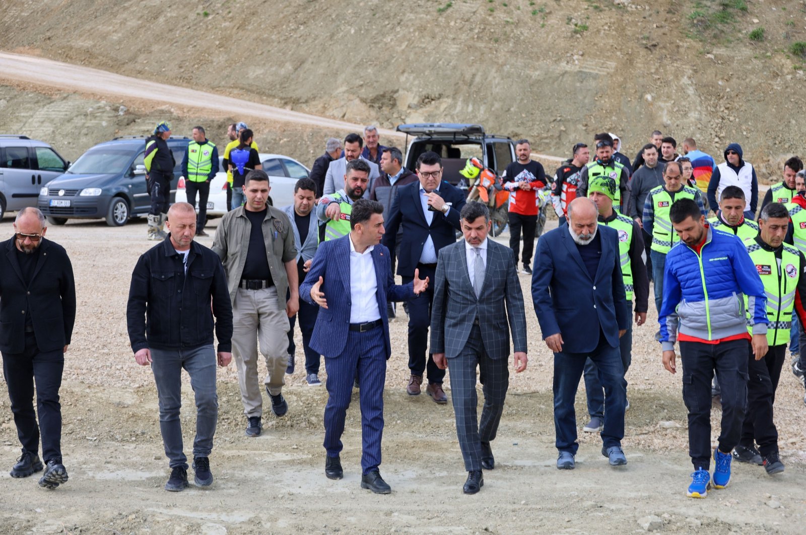 Turkish Motorcycle Federation President Bekir Yunus Uçar (C) walks during a tour at the Endurobil 365 Extrempark, Bilecik, Türkiye, April 8, 2024. (AA Photo)