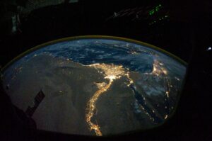 A NASA satellite image, taken by one of the Expedition 25 crew members on the International Space Station, shows the lights of Cairo, Alexandria and the Nile River, Egypt, Oct. 28, 2010. (Reuters Photo)