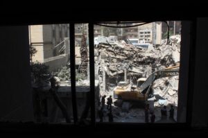 An excavator clears rubble after a suspected Israeli strike on Monday on Iran's consulate, adjacent to the main Iranian embassy building, which Iran said had killed seven military personnel including two key figures in the Quds Force, in the Syrian capital Damascus, Syria April 2, 2024. (Reuters File Photo)