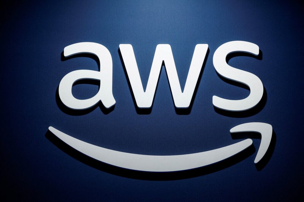 A logo for Amazon Web Services (AWS) is seen during the KubeCon   CloudNativeCon Europe hosted by the Cloud Native Computing Foundation (CNCF) in Paris, France, March 20, 2024. (Reuters Photo)
