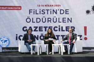 Sinan Burhan (R), journalist Fulya Öztürk (C) and columnist Mustafa Kartoğlu (L) attend the 24-hour broadcast in Istanbul, Türkiye, April 13, 2024. (AA Photo)