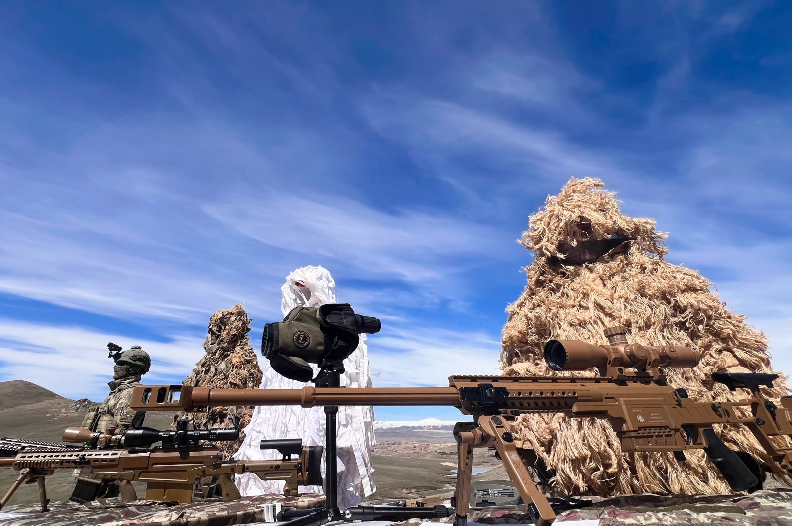 Snipers of the Turkish army pose with their weapons during a military drill in Kars, eastern Türkiye, April 4, 2024. (AA Photo)