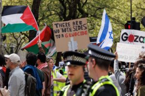 Pro-Palestinian protesters walk past a pro-Israel protest during their march from Russell Square to Parliament Square as part of a national day of action for Palestine, London, U.K., April 13, 2024. (EPA Photo)