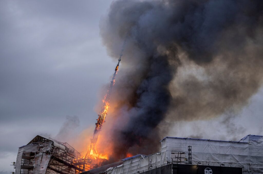 The tower collapsed after the Old Stock Exchange, Boersen, caught fire in Copenhagen, Denmark, April 16, 2024. (Reuters Photo)