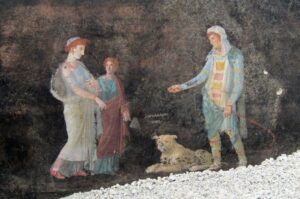 This handout picture shows frescoes depicting mythological characters Helen and Paris according to a Greek inscription placed between the two figures in a banqueting room with black walls, part of the ongoing excavations in block 10 of Regio IX, Pompeii, near Naples, Italy, April 11, 2024. (AFP Photo)