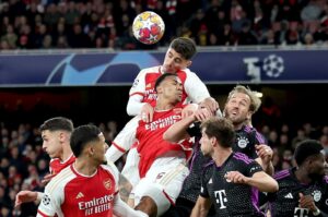 Arsenal's Kai Havertz (C top) rises above his teammate Gabriel and Bayern Munich's Harry Kane to head the ball during the UEFA Champions League quarterfinals, 1st leg match, London, U.K., April 9, 2024. (EPA Photo)