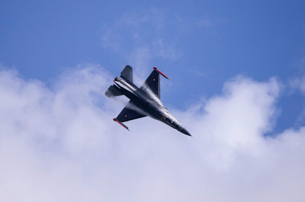 A Danish F-16 aircraft showcases some of its capabilities at a press event at Skrydstrup Air Base in Denmark, where Denmark's minister of defense met his Argentinian counterpart. The occasion is the signing ceremony of the contract for the sale of 24 Danish F-16 combat aircraft to Argentina on April 16, 2024. (AFP Phoıto)