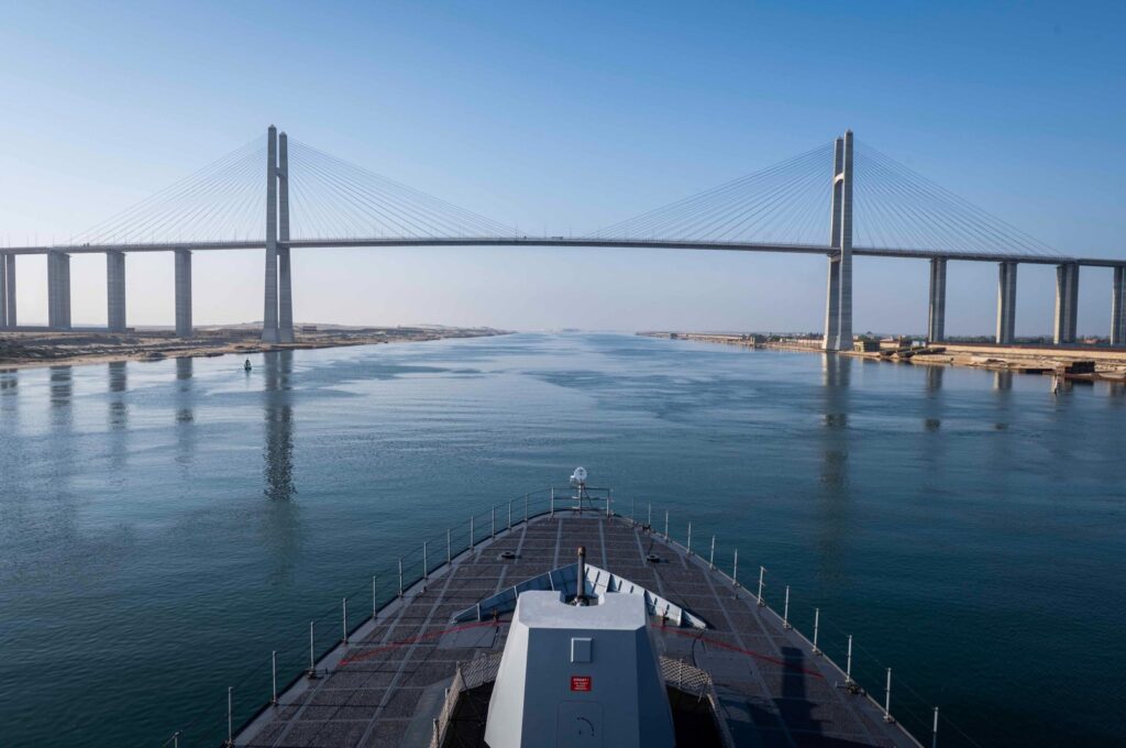 Turkish warship TCG Kınalıada is seen in front of the Suez Canal Bridge, also known as the Egyptian–Japanese Friendship Bridge, Al Salam Bridge, Al Salam Peace Bridge or Mubarak Peace Bridge in this photo released by the Defense Ministry on April 16, 2024. (AA Photo via Defense Ministry)