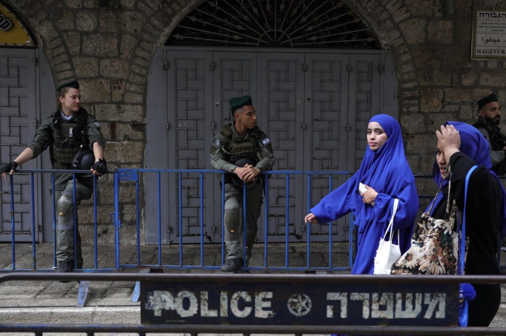 Israeli police keep watch as Muslim worshippers make their way to Friday prayers during the Good Friday procession along the Via Dolorosa, East Jerusalem, Palestine, March 29, 2024. (EPA Photo)