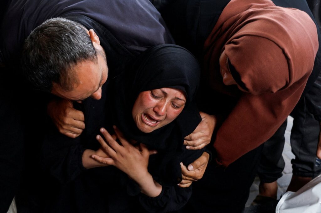 A woman reacts next to the bodies of Palestinians killed in Israeli strikes, amid the ongoing Israeli bombardments, Rafah, Gaza Strip, Palestine, April 16, 2024. (Reuters Photo)