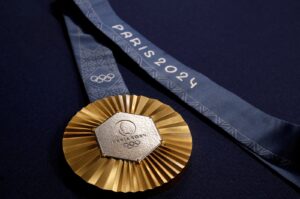 A Paris 2024 Olympic Games gold medal is seen on display at Chaumet jewellery, Paris, France, Feb. 1, 2024. (Reuters Photo)