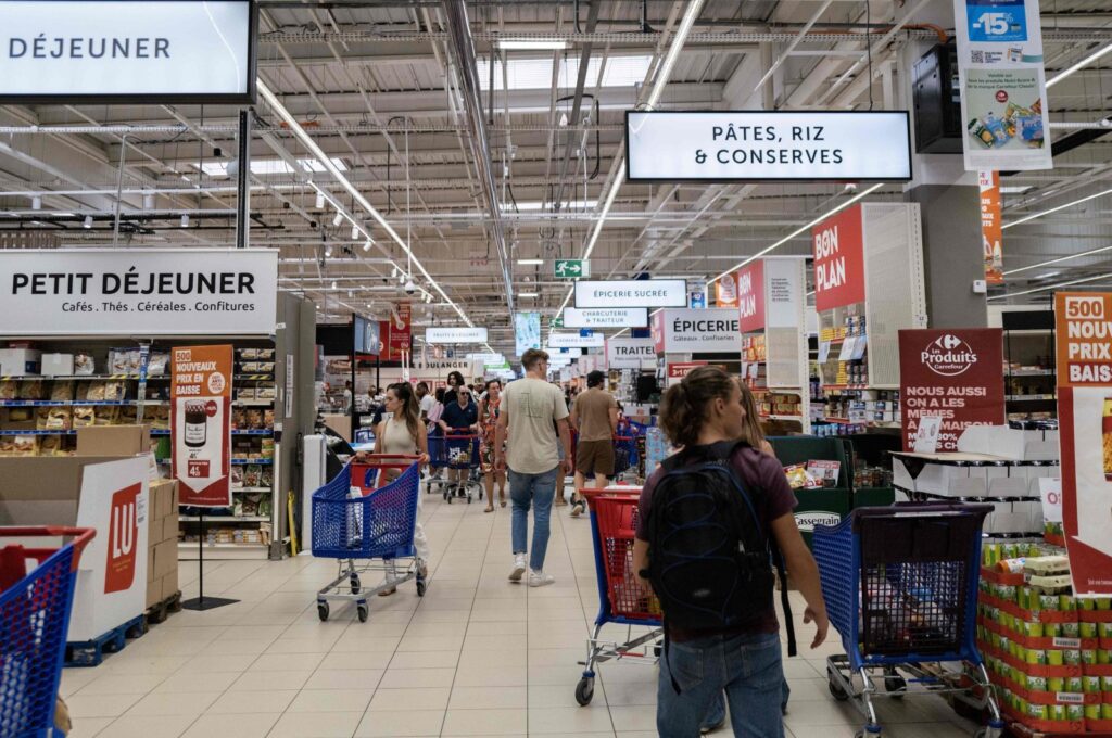 People shop in a supermarket in Toulouse, southwestern France, Sept. 4, 2023. (AFP Photo)