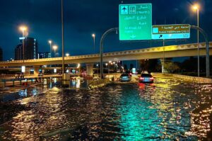 Motorists drive along a flooded street following heavy rains, Dubai, UAE, April 17, 2024. (AFP Photo)