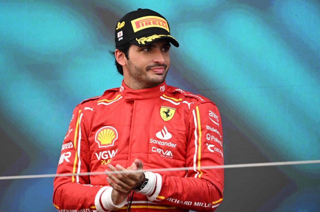 Ferrari's Spanish driver Carlos Sainz stands on the podium after finishing third in the Formula One Japanese Grand Prix race at the Suzuka circuit, Suzuka, Japan, April 7, 2024. (AFP Photo)