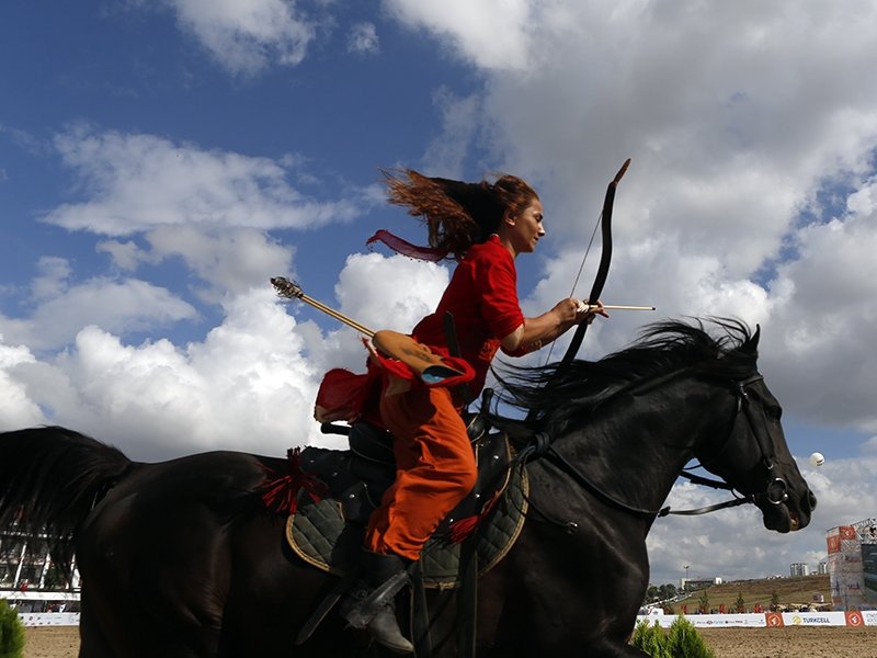 A female traditional mounted archer in action. (Courtesy of Turkish Traditional Sports Federation)