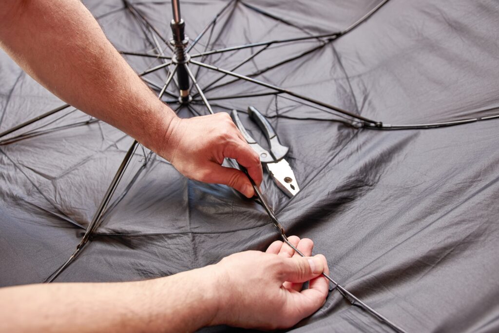 Marija Lah, Slovenia's last umbrella repairer, sustains her family's tradition by fixing umbrellas. (Shutterstock Photos)